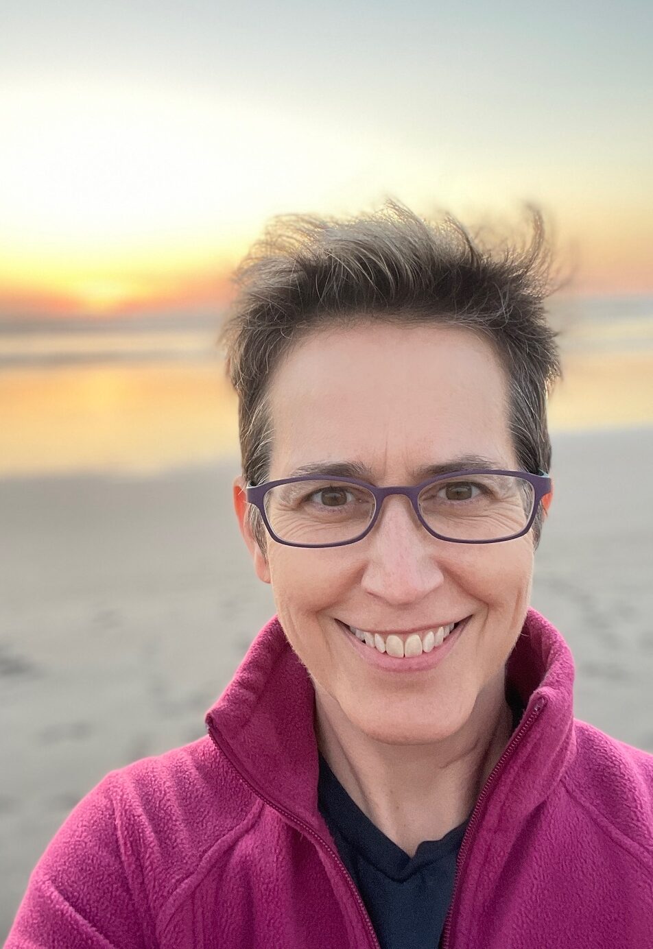 Christine at the beach during sunset